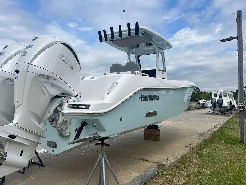 Slide: The Image of 2024 Everglades 285 Center Console boat with twin Yamaha outboard engines on a trailer. - 7