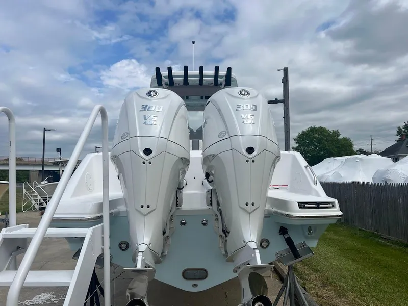 Slide: The Image of 2024 Everglades 285 Center Console with twin Yamaha V6 outboard engines. - 9