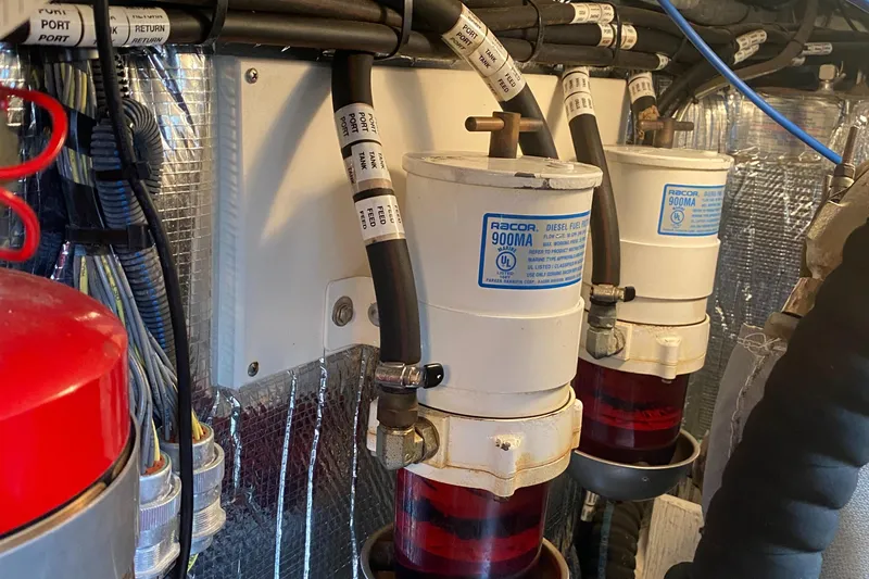 Slide: The Image of Engine room of 2006 Cruisers Yachts 370 Express with Racor fuel filters. - 37