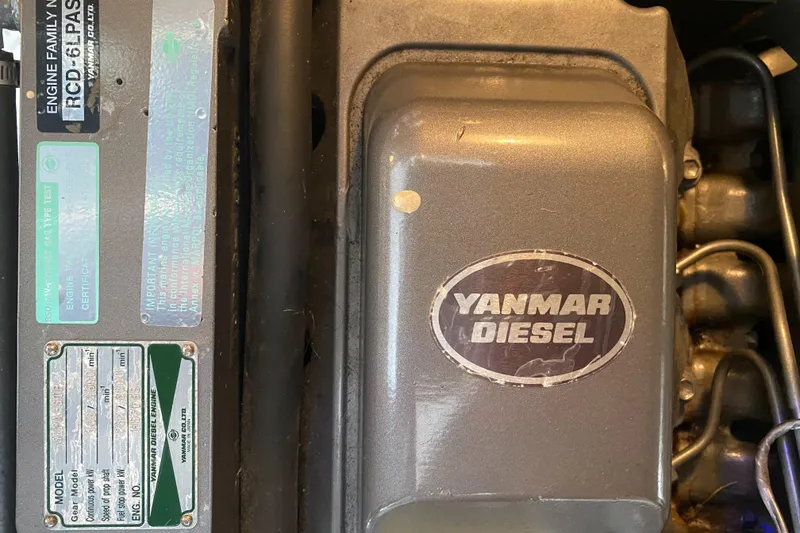 Slide: The Image of Yanmar diesel engine in 2006 Cruisers Yachts 370 Express, showcasing engine details and labels. - 39