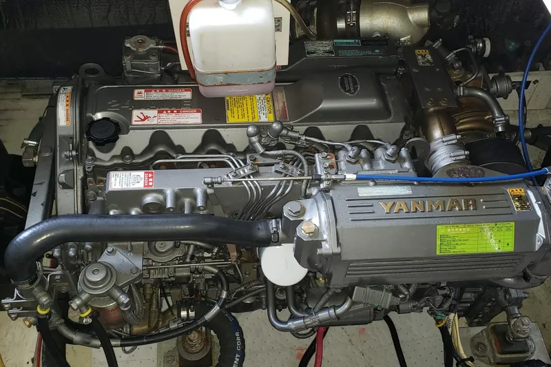 Slide: The Image of Engine of 2006 Cruisers Yachts 370 Express, featuring a Yanmar diesel engine. - 30