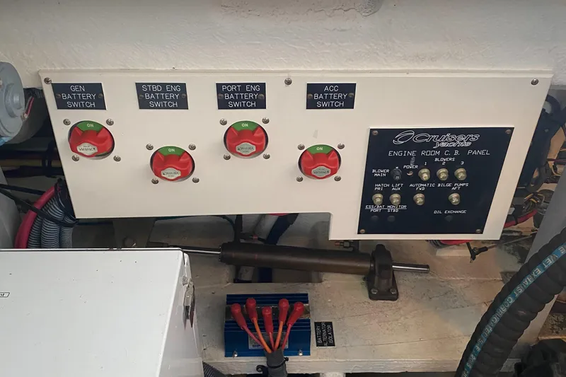 Slide: The Image of Battery switches and control panel in 2006 Cruisers Yachts 370 Express engine room. - 36