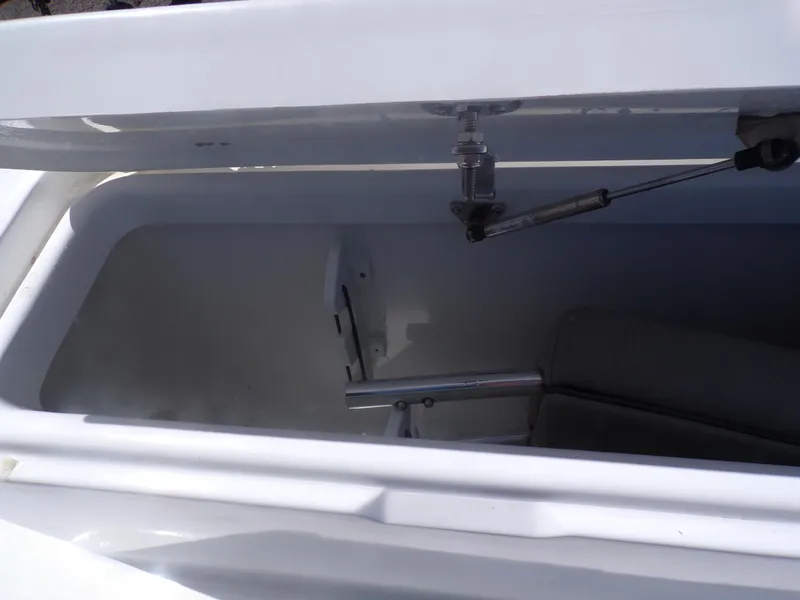 Slide: The Image of Open storage compartment of 2024 Savannah 210X boat. - 16