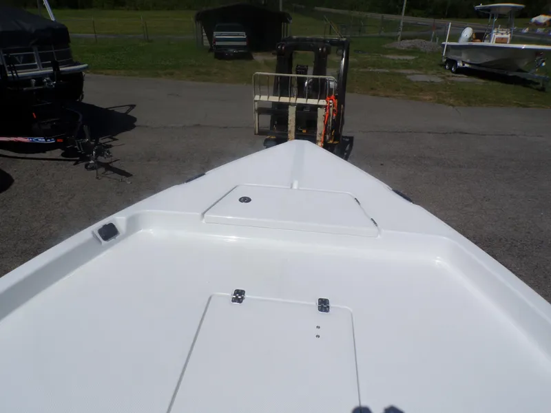 Slide: The Image of 2024 Savannah 210X boat deck, white finish, outdoor display. - 20