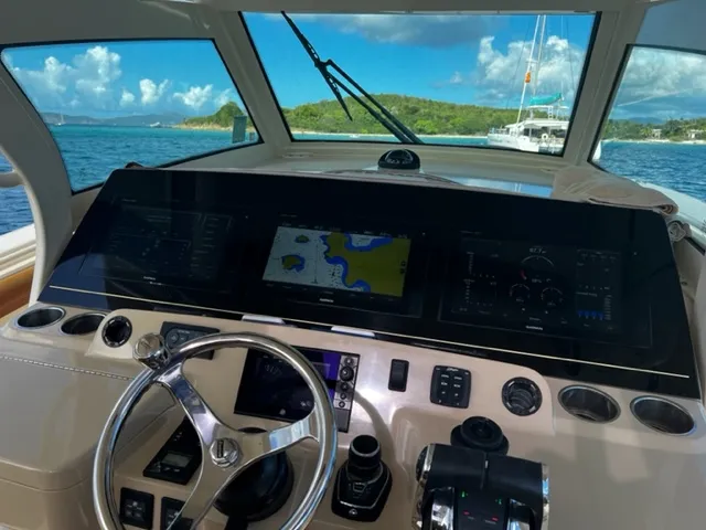 Slide: The Image of Helm of 2018 Scout 380 LXF with navigation screens and steering wheel. - 1