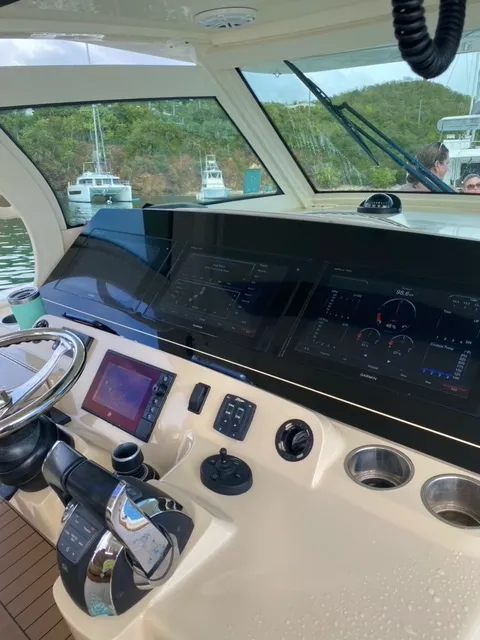 Slide: The Image of Helm of a 2018 Scout 380 LXF boat with advanced navigation systems. - 7
