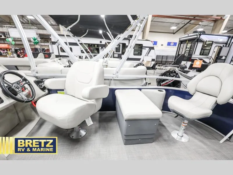 Slide: The Image of 2024 Vista Fish 20 boat interior with seating and steering wheel at Bretz RV & Marine showroom. - 13