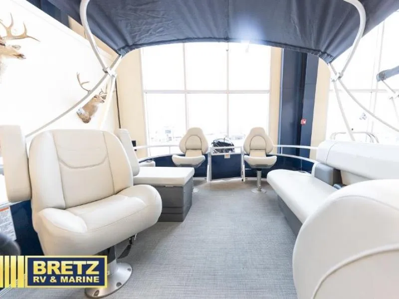 Slide: The Image of Interior of 2024 Vista Fish 20 boat with white seating, displayed at Bretz RV & Marine. - 16