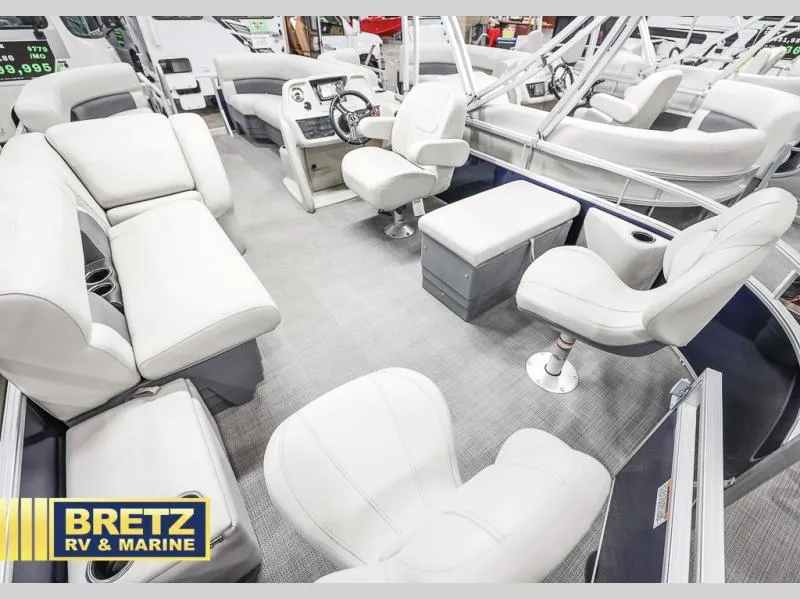 Slide: The Image of 2024 Vista Fish 20 boat interior with plush seating, steering console, and modern design. - 17