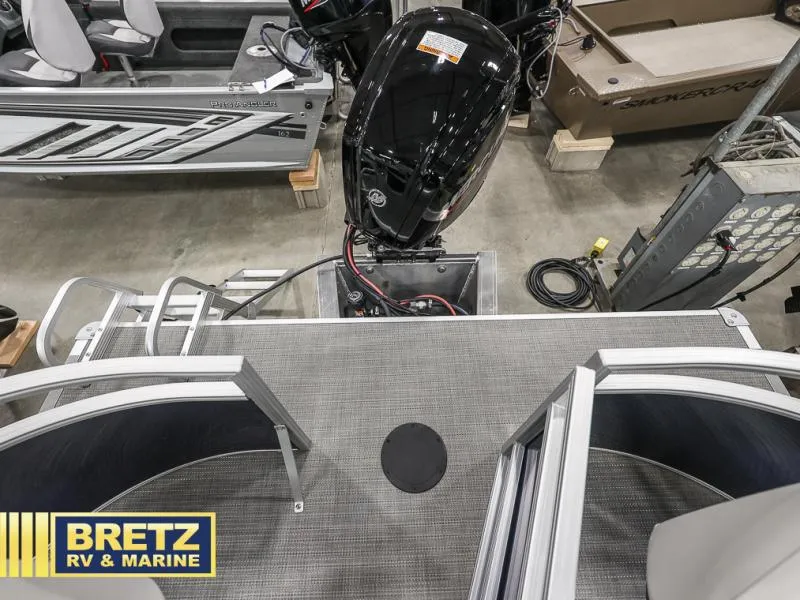 Slide: The Image of 2024 Vista Fish 20 boat with motor, displayed at Bretz RV & Marine showroom. - 24