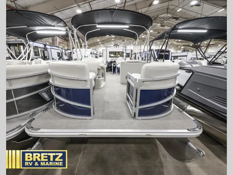 Slide: The Image of 2024 Vista Fish 20 pontoon boat interior at Bretz RV & Marine showroom. - 3