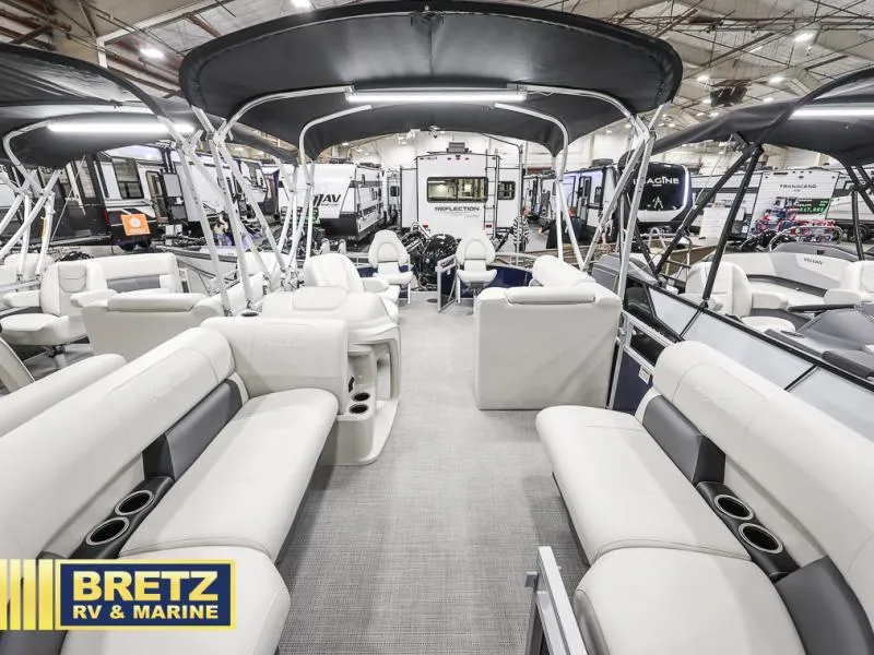 Slide: The Image of 2024 Vista Fish 20 pontoon boat interior at Bretz RV & Marine showroom. - 8