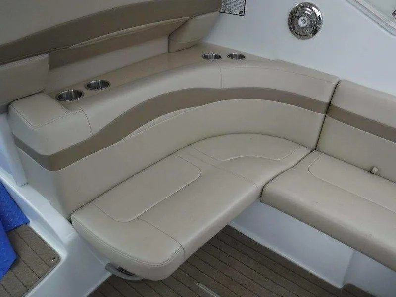 Slide: The Image of Beige seating area on a 2012 Formula 34 Cruiser boat. - 6