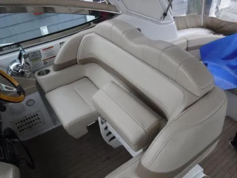 Slide: The Image of 2012 Formula 34 Cruiser interior seating with beige leather upholstery. - 8