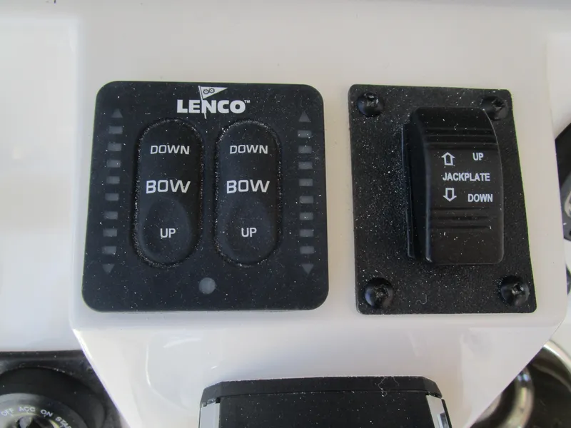 Slide: The Image of Lenco trim tab and jackplate controls on 2024 Ranger 2660 Bay boat. - 18
