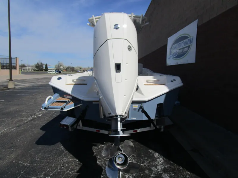 Slide: The Image of 2024 Ranger 2660 Bay boat rear view with outboard motor. - 6