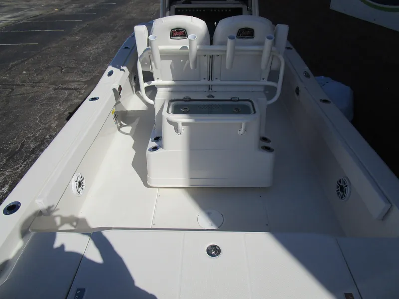 Slide: The Image of 2024 Ranger 2660 Bay boat interior with seating and storage compartments. - 8