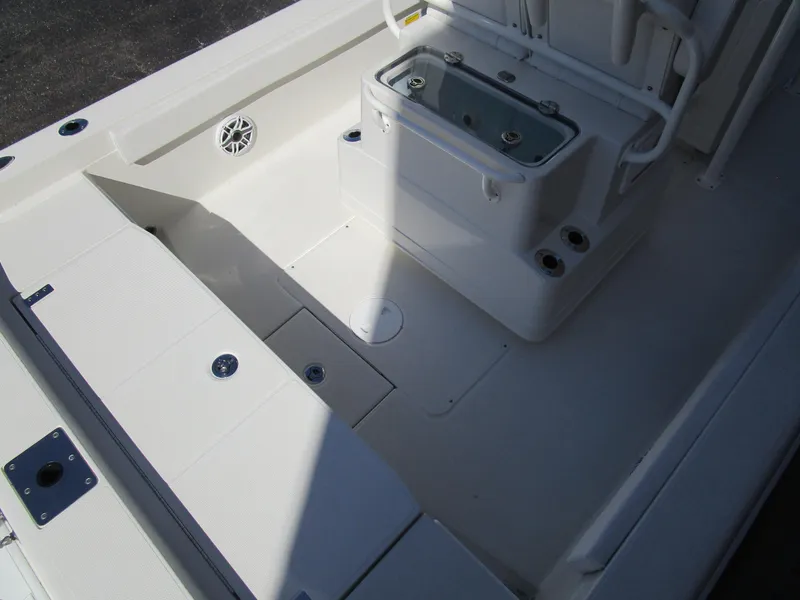 Slide: The Image of 2024 Ranger 2660 Bay boat interior with storage compartments and livewell. - 9