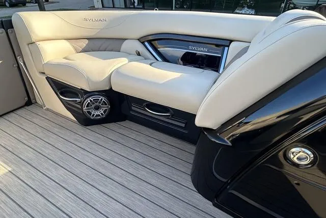 Slide: The Image of 2024 Sylvan M3 DLZ boat interior with luxurious seating and modern design. - 11