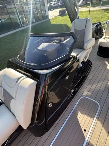Slide: The Image of 2024 Sylvan M3 DLZ boat interior with modern helm and luxurious seating. - 15