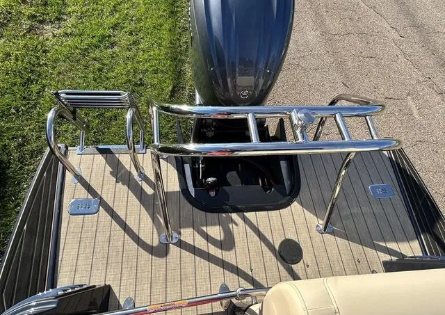 Slide: The Image of 2024 Sylvan M3 DLZ boat stern with motor and swim platform. - 45