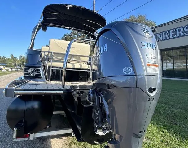 Slide: The Image of 2024 Sylvan M3 DLZ pontoon boat with Yamaha 300 V6 outboard motor. - 8