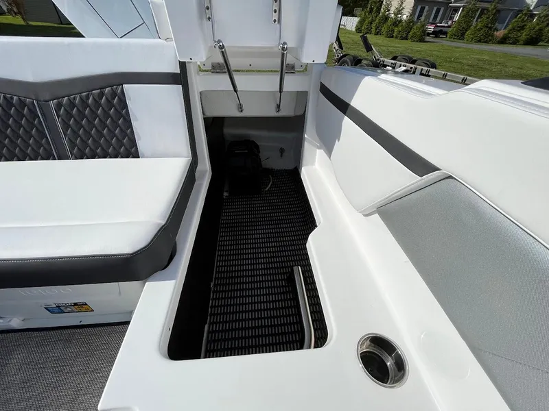 Slide: The Image of 2024 Monterey M-205 boat interior with seating and storage compartment. - 10