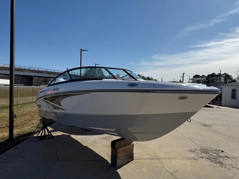 Slide: The Image of 2024 Monterey M-205 boat displayed outdoors on a sunny day. - 4