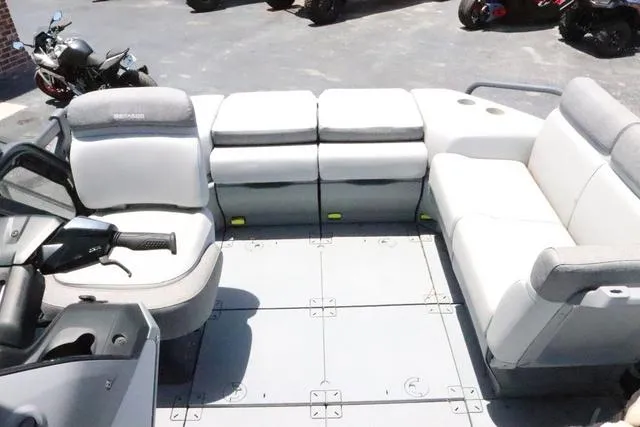 Slide: The Image of 2024 Sea-Doo Switch® Cruise 18 interior with spacious seating and modern design. - 13