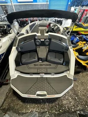 Slide: The Image of 2023 Scarab 165 ID boat with sleek design and comfortable seating. - 4