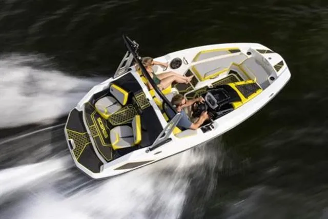Slide: The Image of 2023 Scarab 165 ID speedboat cruising on water, featuring sleek design and vibrant accents. - 7