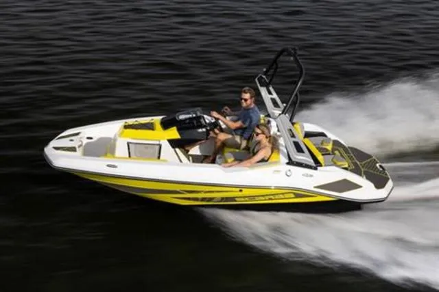 Slide: The Image of 2023 Scarab 165 ID speedboat cruising on water, featuring sleek yellow and white design. - 9