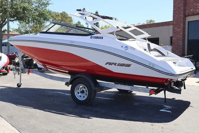 Slide: The Image of 2024 Yamaha AR195 boat interior with sleek seating and modern design. - 4