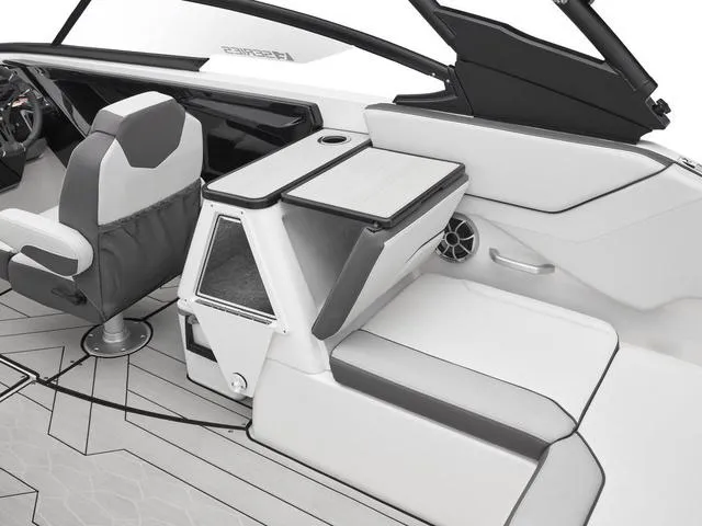 Slide: The Image of 2024 Yamaha Boats 252XE-MIST GRAY-GALVANIZE interior seating and helm station. - 4