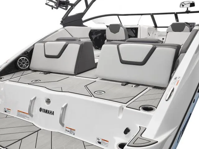 Slide: The Image of 2024 Yamaha Boats 252XE-MIST GRAY-GALVANIZE, rear seating and deck view. - 6