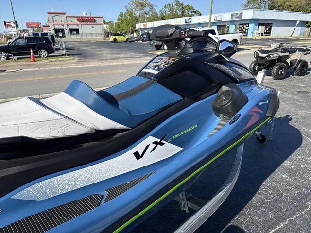 Slide: The Image of 2024 Yamaha Marine Waverunner VX Cruiser in Deepwater Blue, parked outdoors. - 9