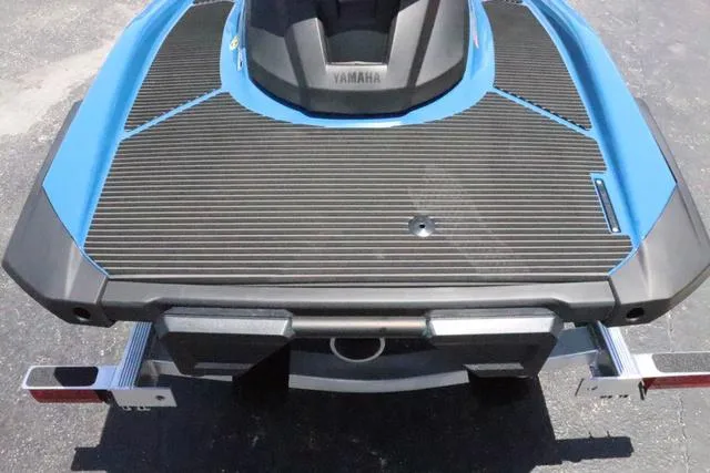 Slide: The Image of 2024 Yamaha Marine Waverunner VX Cruiser rear view, blue and black design. - 12