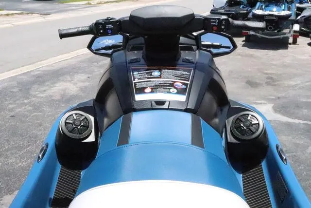 Slide: The Image of 2024 Yamaha Marine Waverunner VX Cruiser with audio system, blue and black design. - 14