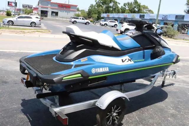 Slide: The Image of 2024 Yamaha Marine Waverunner VX Cruiser with audio, blue and white seat. - 7