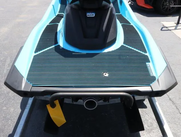 Slide: The Image of 2024 Yamaha Marine Waverunner VX Deluxe in cyan, rear view on trailer. - 12