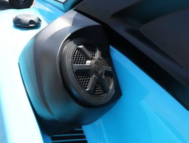 Slide: The Image of 2024 Yamaha Marine Waverunner VX Deluxe with audio system, cyan color, close-up of speaker. - 13