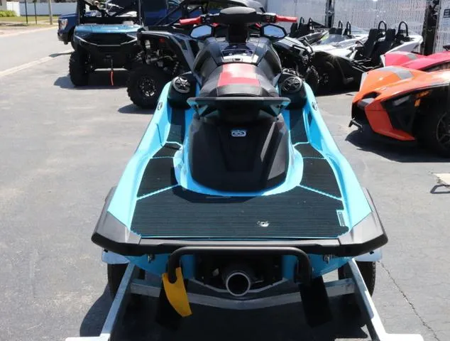 Slide: The Image of 2024 Yamaha Marine Waverunner VX Deluxe with Audio, cyan color, close-up of handlebars and controls. - 4
