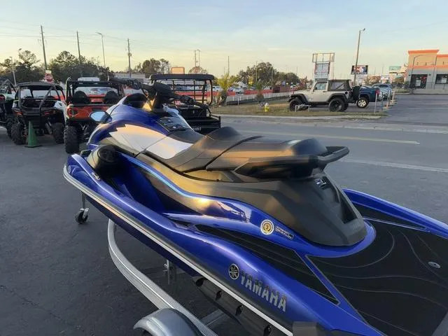 Slide: The Image of 2024 Yamaha Marine Waverunner GP SVHO in blue, parked on a trailer. - 7