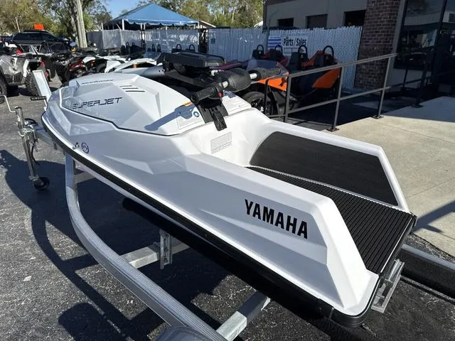 Slide: The Image of Woman riding 2023 Yamaha WaveRunner SuperJet on water. - 5