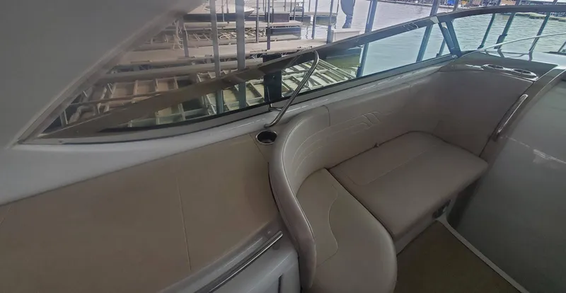 Slide: The Image of Interior seating of 2009 Formula 400 Super Sport boat with beige upholstery. - 13