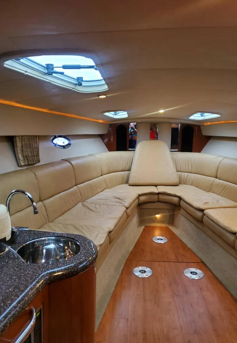 Slide: The Image of Interior of 2009 Formula 400 Super Sport yacht with plush seating and kitchenette. - 21