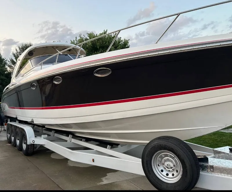 Slide: The Image of 2009 Formula 400 Super Sport boat on a trailer. - 3