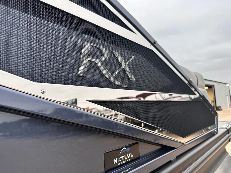Slide: The Image of 2024 Bennington 23 RXSBA boat detail with RX logo and sleek design. - 11