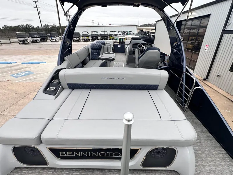 Slide: The Image of 2024 Bennington 23 RXSBA pontoon boat with luxurious seating and modern design. - 13