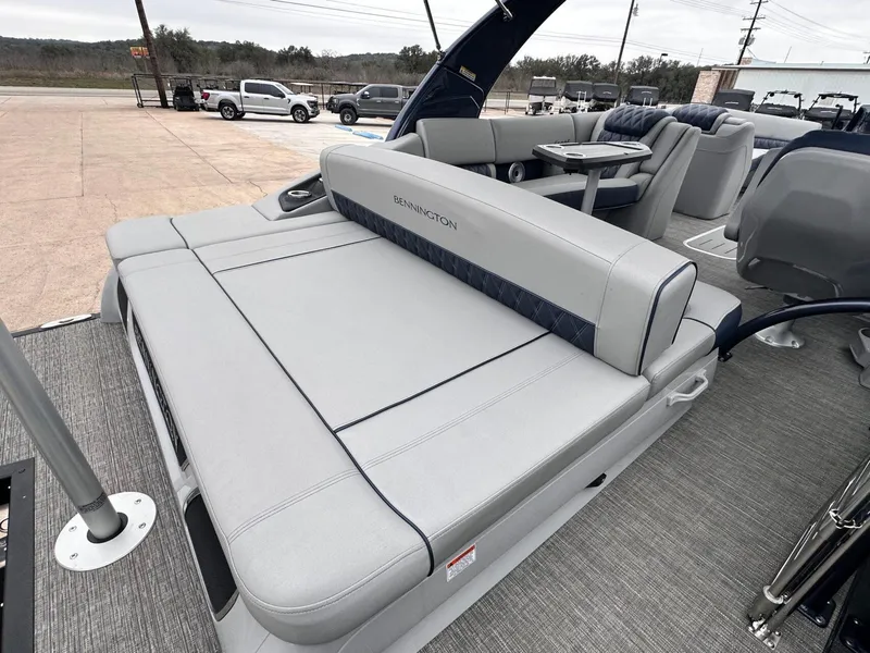 Slide: The Image of 2024 Bennington 23 RXSBA pontoon boat with luxurious seating and modern design. - 15